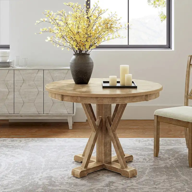 Table à manger ronde Felicia Farmhouse en bois massif naturel avec piètement croisé pour 4 personnes par